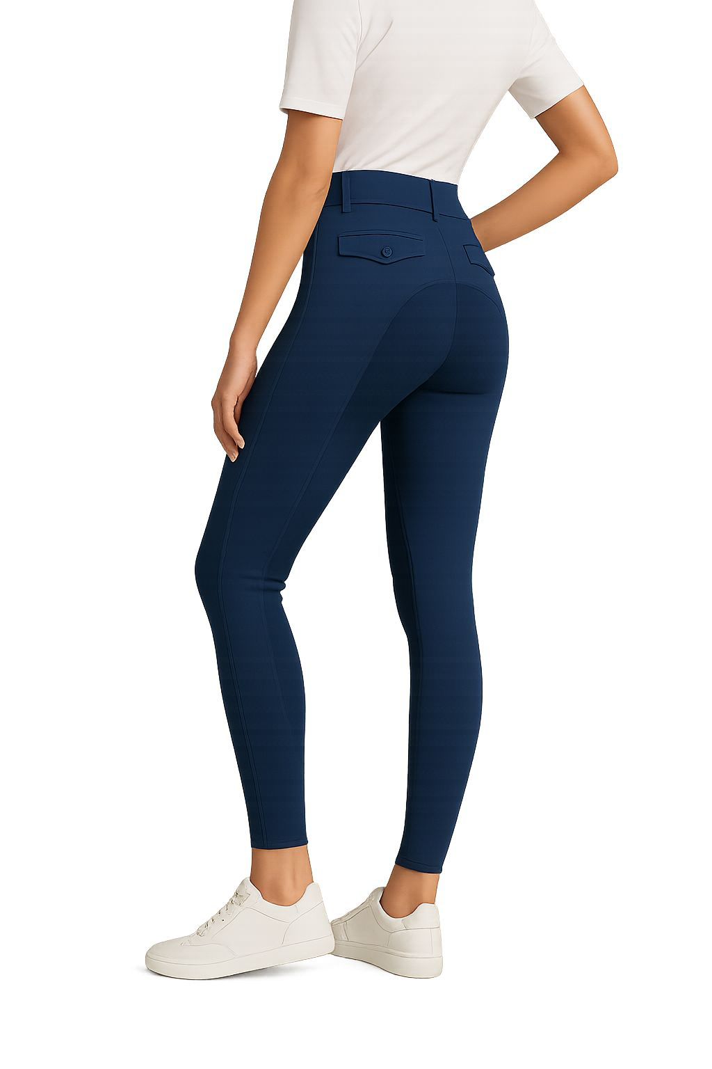 Person wearing navy blue leggings with a white top and shoes on a white background