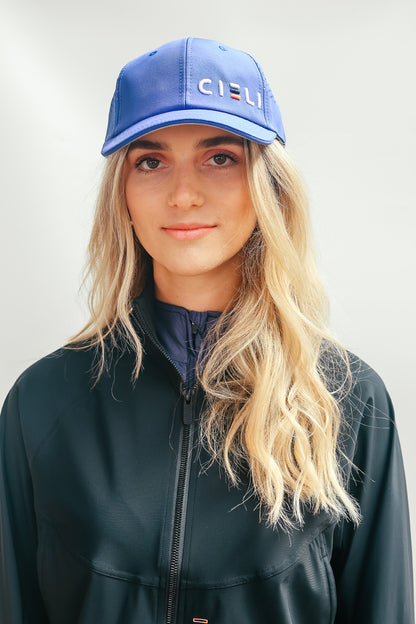 A Cieli Equestrian peak mesh baseball cap in royal blue ideal for horse safari.