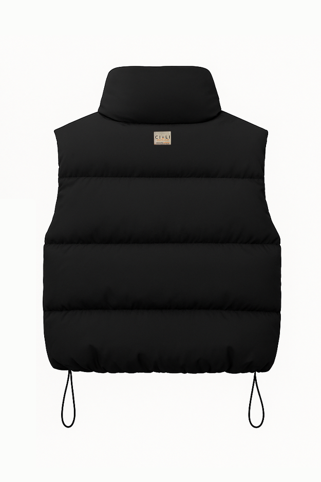 Black puffer vest on a white background