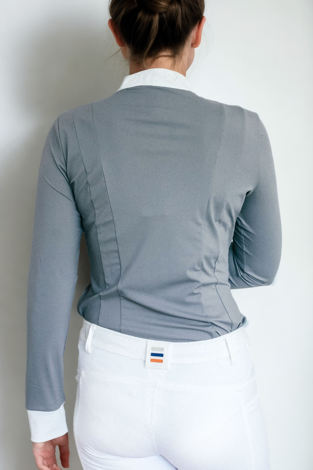 Ladies Cieli Equestrian riding long sleeve show shirt in grey with white bib and magnetic closure.