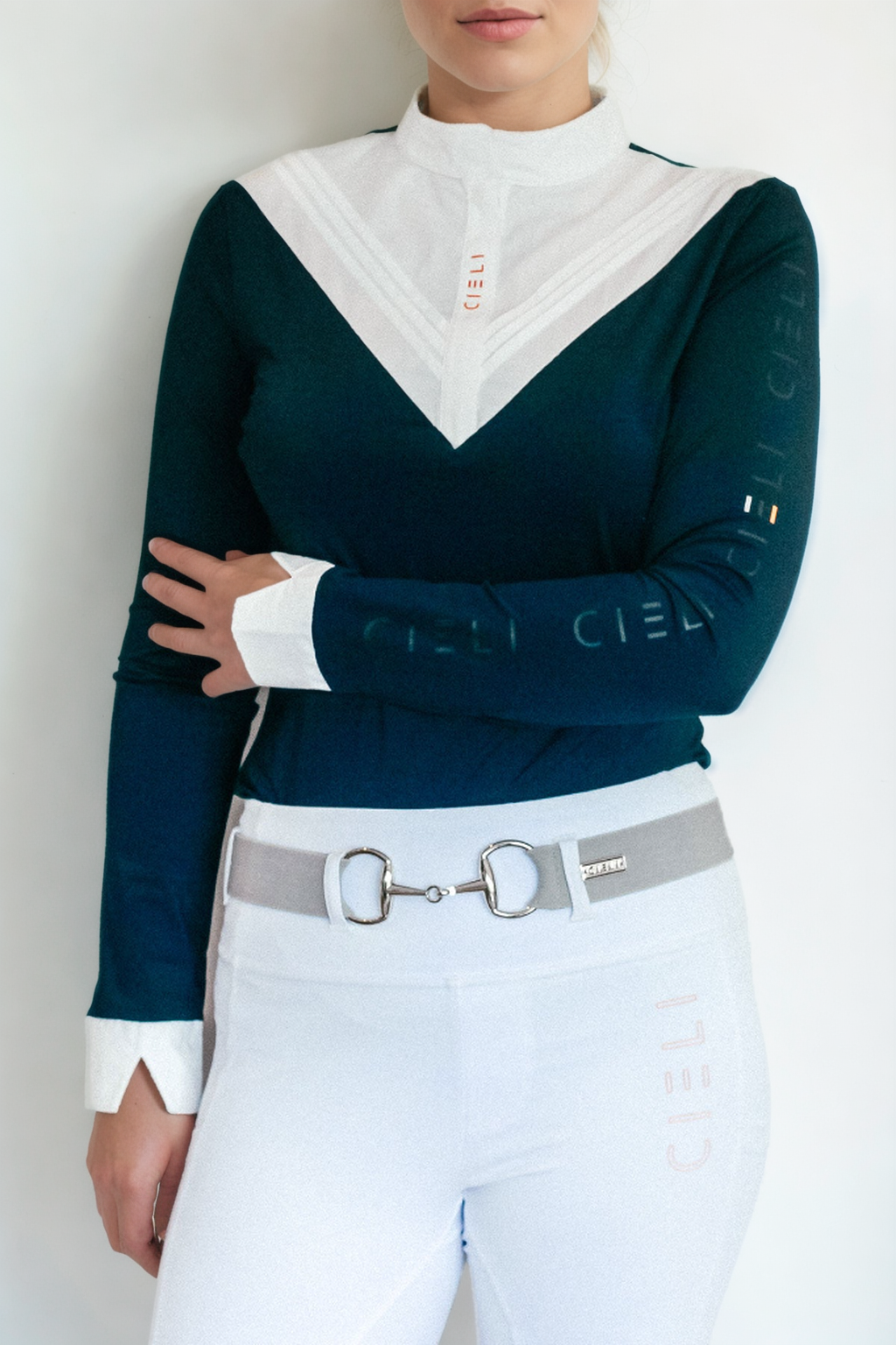 Ladies Cieli Equestrian riding long sleeve show shirt in navy with white bib and magnetic closure.