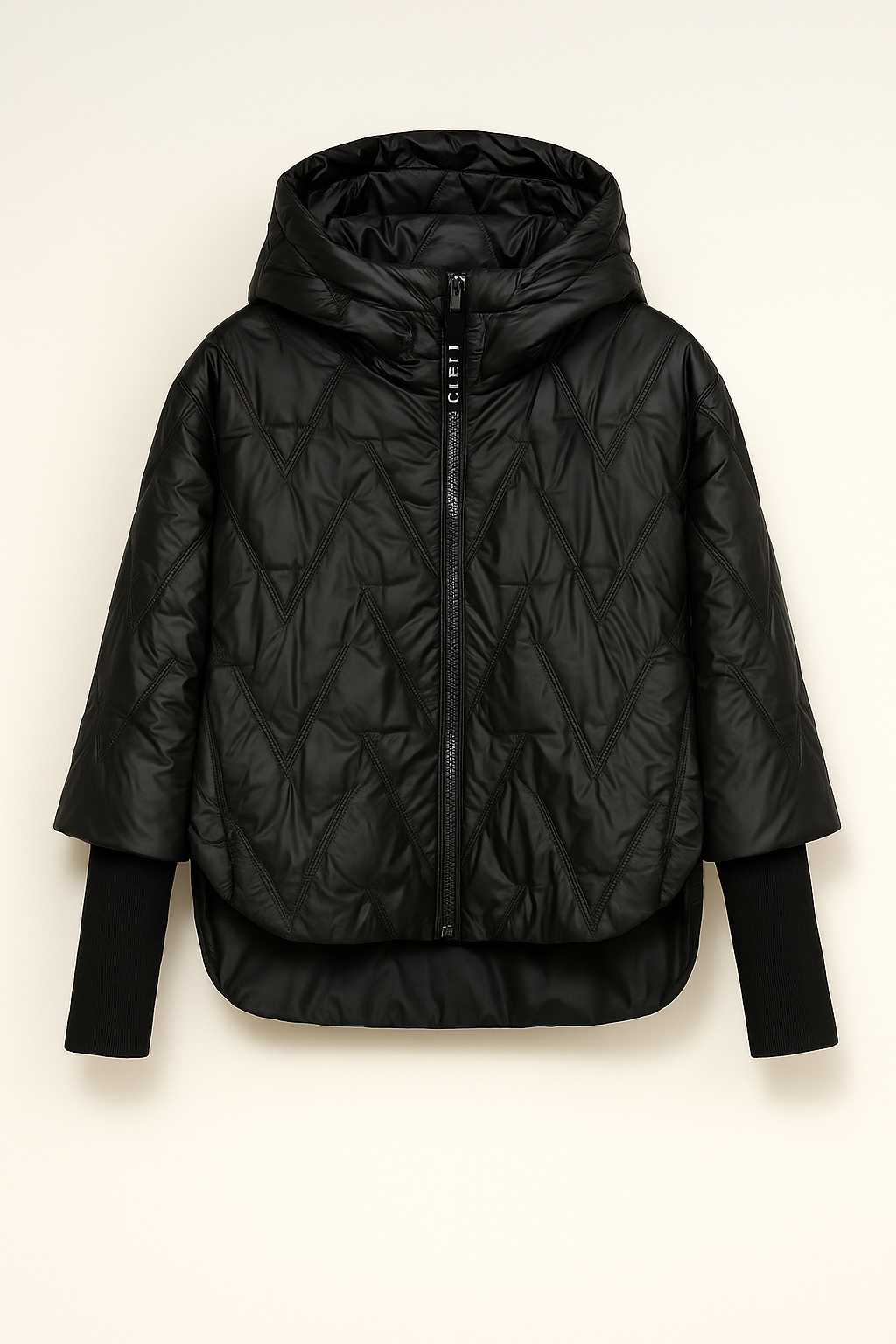 Black quilted jacket on a light beige background