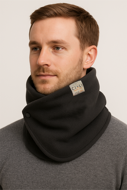 Man wearing a dark grey neck warmer with a visible brand logo on a plain background