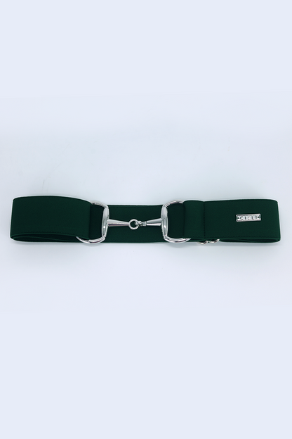 lady wearing a Cieli Equestrian elastic snaffle bit belt in green with a silver buckle that is one size fits all