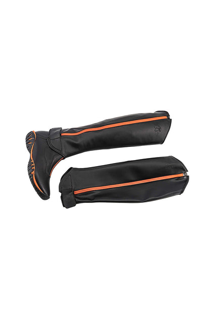 The Sergio Grass Flexy chap Walk and Ride line made of elastic, thin orange and black leather and has a zip on the outside ideal for African horse riding safaris